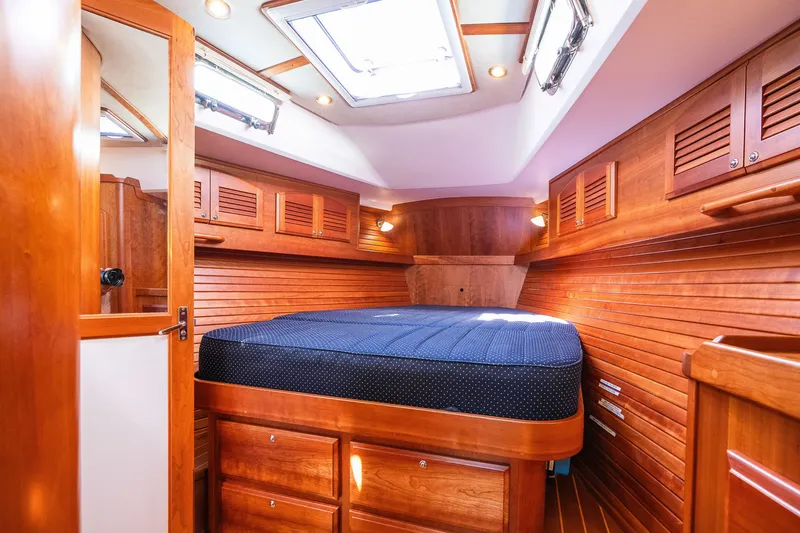 Slide: The Image of Luxurious wooden cabin interior of 2013 Sabre 456 yacht with skylight and cozy bed. - 17