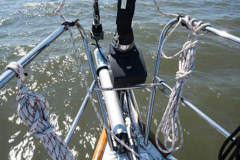 Slide: The Image of Bow of 2013 Sabre 456 sailboat with ropes and ocean view. - 65