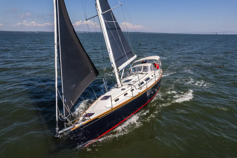 Slide: The Image of Sailing yacht Sabre 456 (2013) navigating open waters under clear skies. - 2