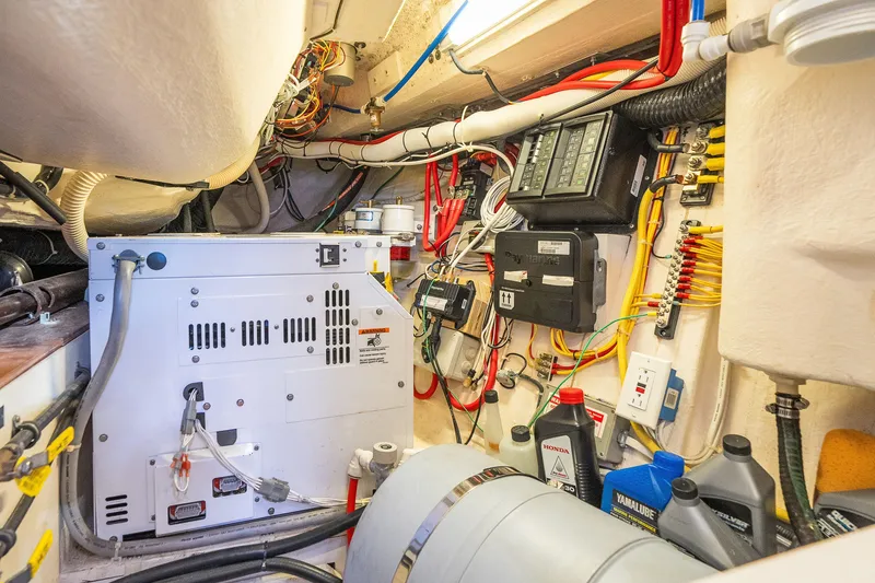 Slide: The Image of Engine room of a 2013 Sabre 456 yacht with electrical panels and wiring. - 27