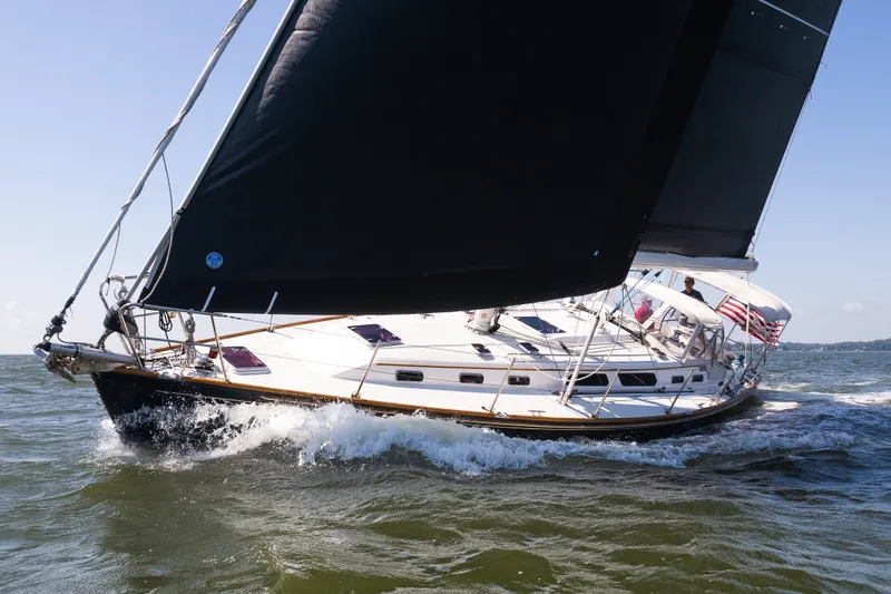 The Image of Sailing yacht Sabre 456 (2013) with black sails on open water. - 1