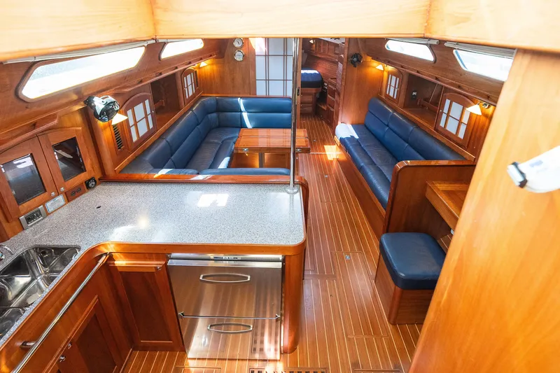 Slide: The Image of Luxurious interior of 2013 Sabre 456 yacht with wood finish and blue seating. - 3