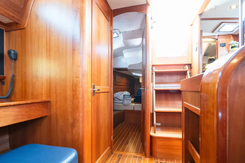 Slide: The Image of Interior of 2013 Sabre 456 yacht with wooden cabinetry and seating. - 28