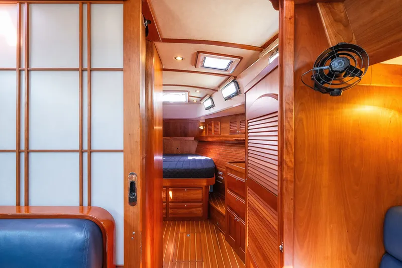 Slide: The Image of Luxurious interior of 2013 Sabre 456 yacht with wooden finishes and cozy cabin. - 16