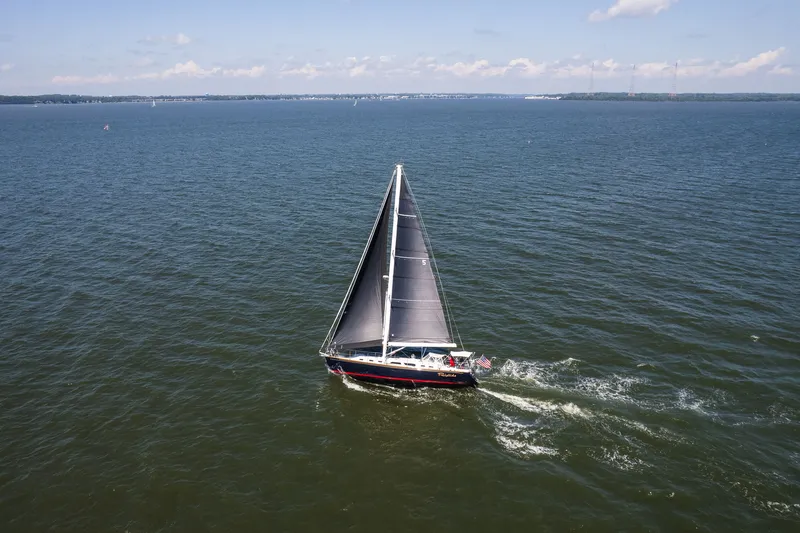Slide: The Image of Sailing yacht Sabre 456 (2013) gliding on open water under clear skies. - 44