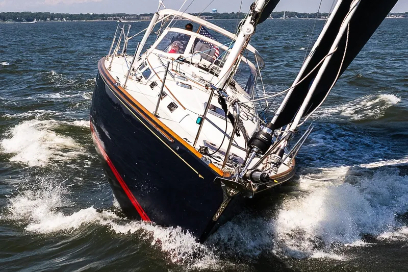 Slide: The Image of Sailing yacht Sabre 456 (2013) navigating through waves on open water. - 47