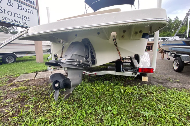 Slide: The Image of Rear view of a 2017 Regal 1900 ES Bowrider boat on a trailer. - 5