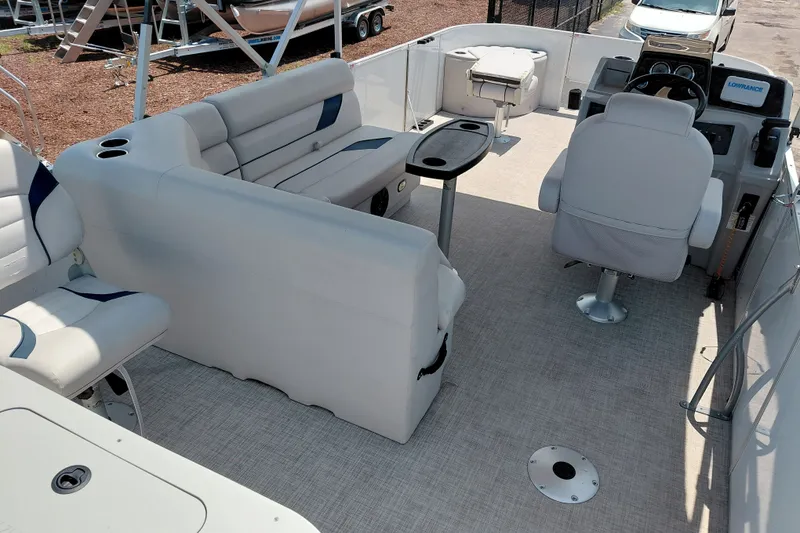 Slide: The Image of Interior of 2022 SunCatcher Select 20F pontoon boat with seating and steering console. - 24
