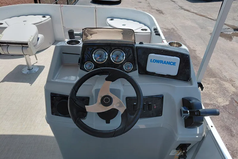 Slide: The Image of Steering console of 2022 SunCatcher Select 20F boat with Lowrance navigation system. - 22