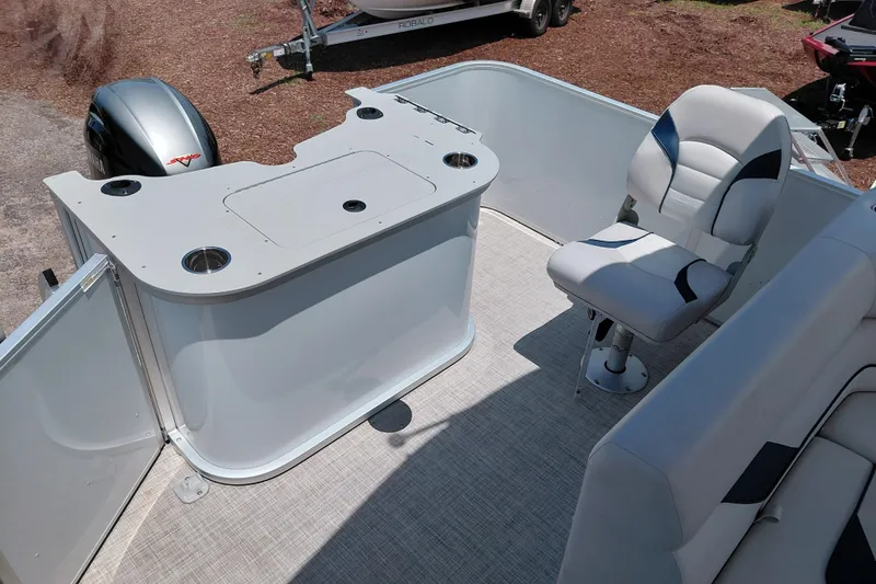 Slide: The Image of Interior of 2022 SunCatcher Select 20F boat with seating and motor view. - 28