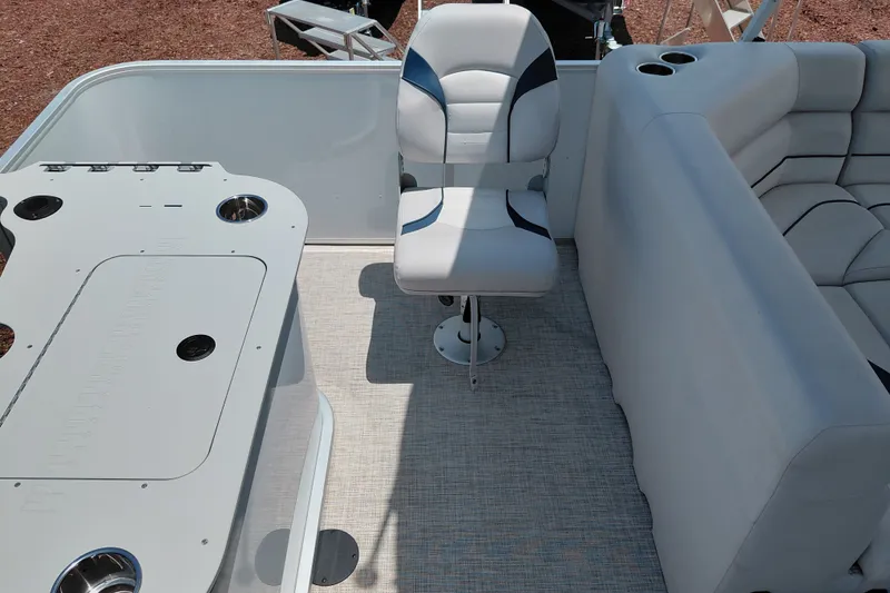 Slide: The Image of Interior of 2022 SunCatcher Select 20F boat with seating and table setup. - 29