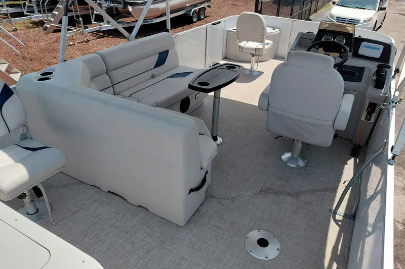 Slide: The Image of Interior of 2022 SunCatcher Select 20F pontoon boat with seating and steering console. - 33