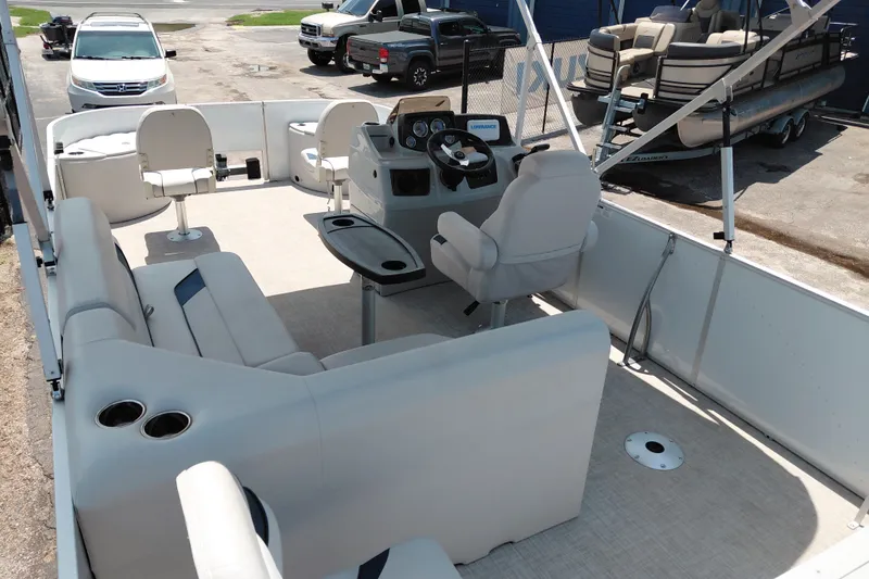 Slide: The Image of Interior of 2022 SunCatcher Select 20F pontoon boat with seating and steering console. - 32