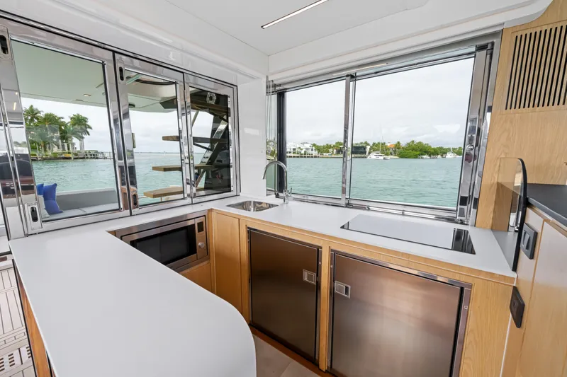 Slide: The Image of Modern kitchen interior on 2025 OKEAN 52 yacht with ocean view. - 39