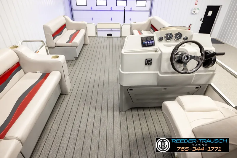 Slide: The Image of Interior of a 2003 Fisher 220 FISH boat with seating and steering console. - 17