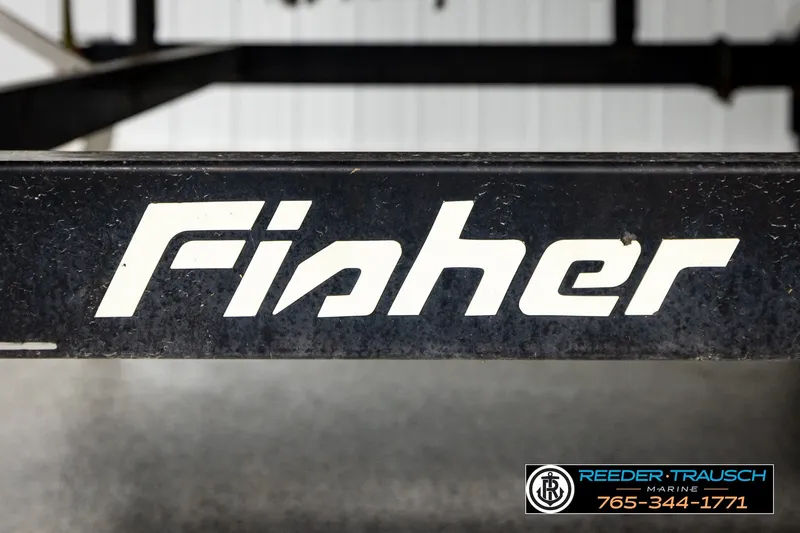Slide: The Image of Close-up of Fisher 220 FISH 2003 boat trailer logo with contact details. - 34