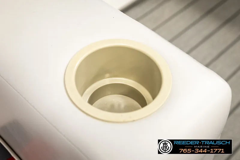 Slide: The Image of Cup holder on a 2003 Fisher 220 FISH boat, Reeder Trausch Marine logo visible. - 29