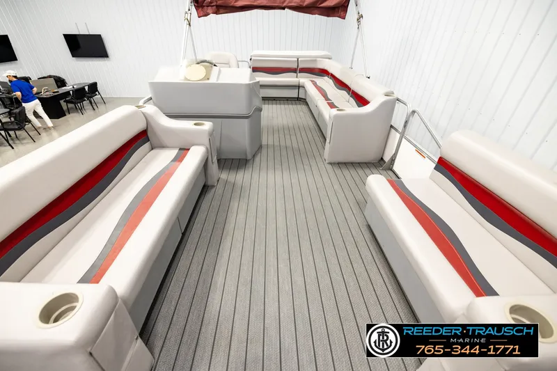 Slide: The Image of Interior of 2003 Fisher 220 FISH boat with spacious seating and modern design. - 13