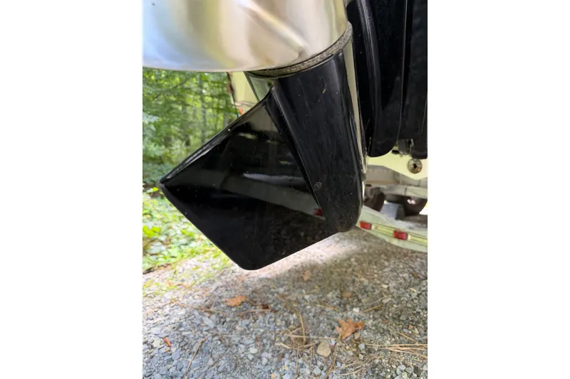 Slide: The Image of 2016 Sea Ray Sundancer 260 boat detail on gravel path. - 69