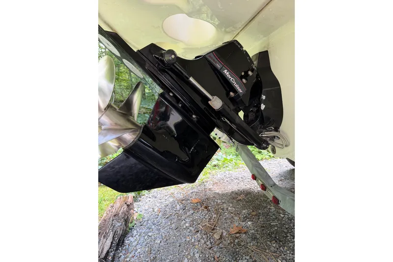 Slide: The Image of Close-up of a 2016 Sea Ray Sundancer 260 boat's MerCruiser engine and propeller. - 67
