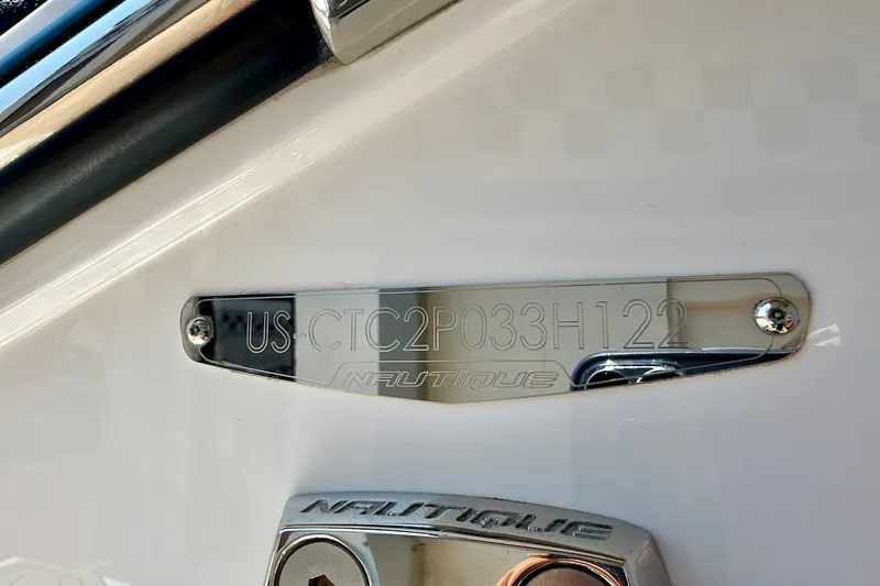Slide: The Image of 2022 Nautique Super Air Nautique G23 Paragon hull identification number plate. - 26