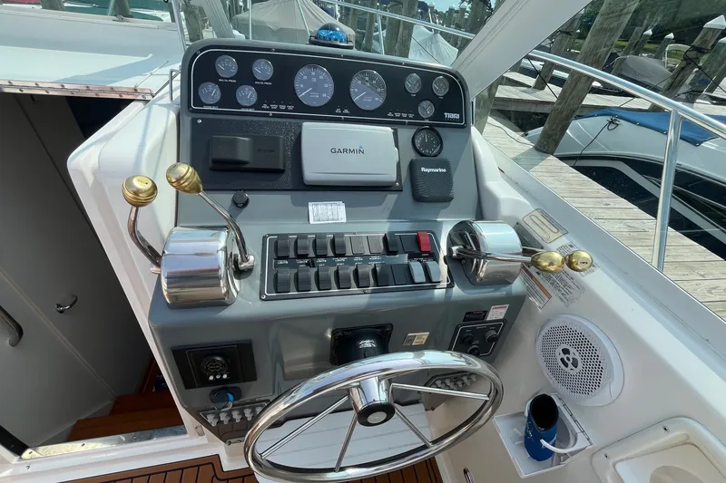 Slide: The Image of Helm of 2001 Tiara Yachts 2900 Coronet with Garmin navigation and control panel. - 17