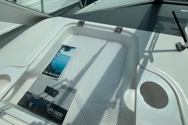 Slide: The Image of 2001 Tiara Yachts 2900 Coronet deck with Lake Minnetonka brochure and Fusion manual. - 20