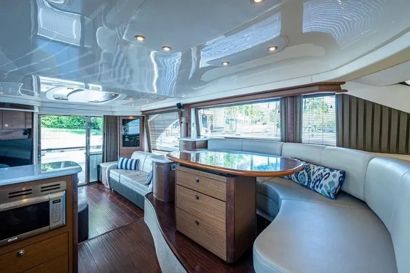 Slide: The Image of Luxurious interior of 2013 Sea Ray 580 Sedan Bridge yacht with modern furnishings. - 8