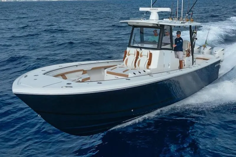 The Image of 2027 Regulator 35 boat cruising on open ocean waters. - 1