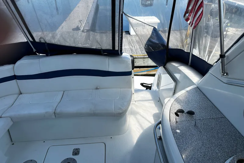 Slide: The Image of 2007 Formula 34 Performance Cruiser interior with seating and American flag. - 14
