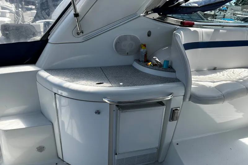 Slide: The Image of 2007 Formula 34 Performance Cruiser interior with seating and storage area. - 16