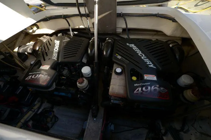 Slide: The Image of Twin MerCruiser 496 engines in a 2007 Formula 34 PC boat. - 33