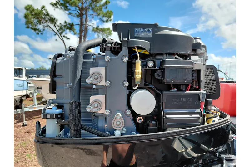 Slide: The Image of 2023 Viaggio Del Mar C engine close-up with visible components under a blue sky. - 39