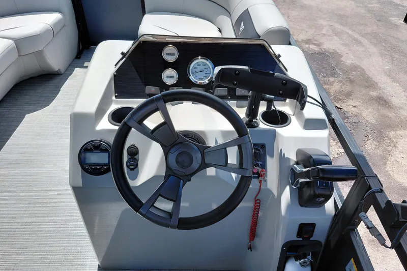 Slide: The Image of 2023 Viaggio Del Mar C boat dashboard with steering wheel and gauges. - 24