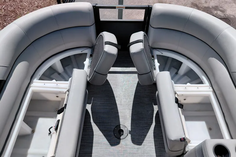 Slide: The Image of 2023 Viaggio Del Mar C boat interior with gray seating and storage compartments. - 20
