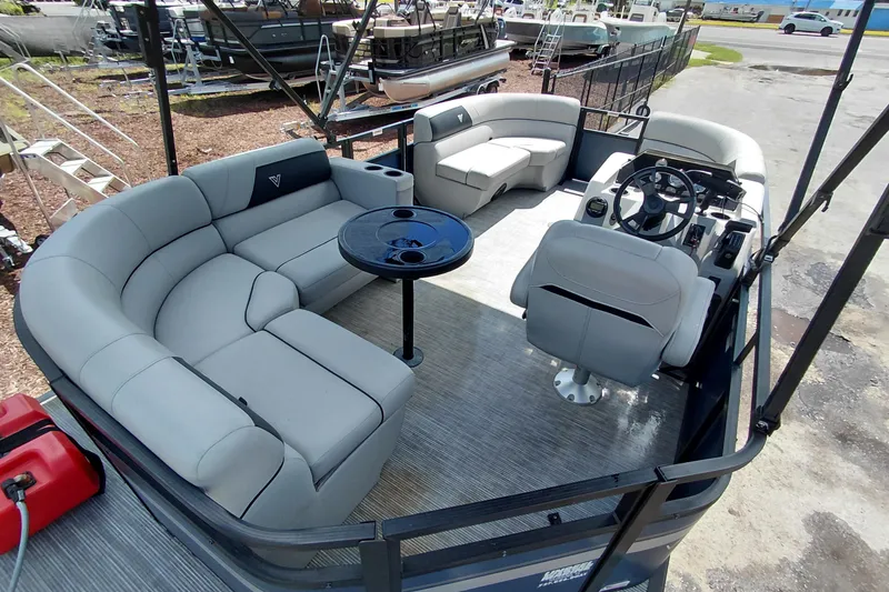 Slide: The Image of 2023 Viaggio Del Mar C pontoon boat with spacious seating and modern helm. - 33