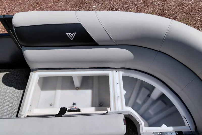Slide: The Image of 2023 Viaggio Del Mar C boat seat with open storage compartment, featuring sleek gray upholstery. - 18