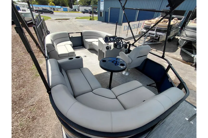 Slide: The Image of 2023 Viaggio Del Mar C pontoon boat with spacious seating and modern helm. - 36
