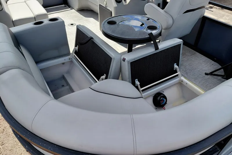 Slide: The Image of 2023 Viaggio Del Mar C boat interior with open storage compartments and seating. - 29