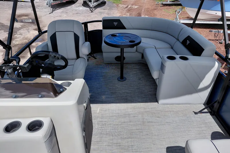 Slide: The Image of Interior of 2023 Viaggio Del Mar C pontoon boat with seating and steering console. - 25