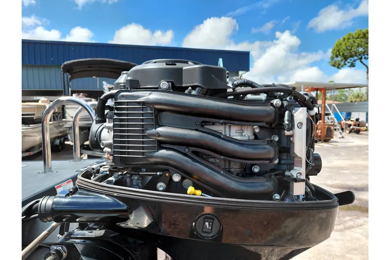 Slide: The Image of 2023 Viaggio Del Mar C boat engine, outdoor setting, clear sky background. - 40