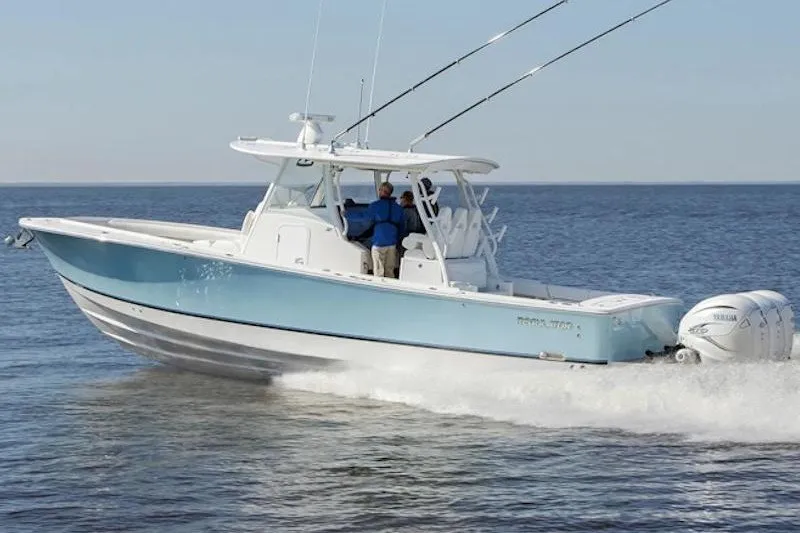 The Image of 2027 Regulator 37 boat cruising on open water, featuring sleek design and powerful engines. - 1