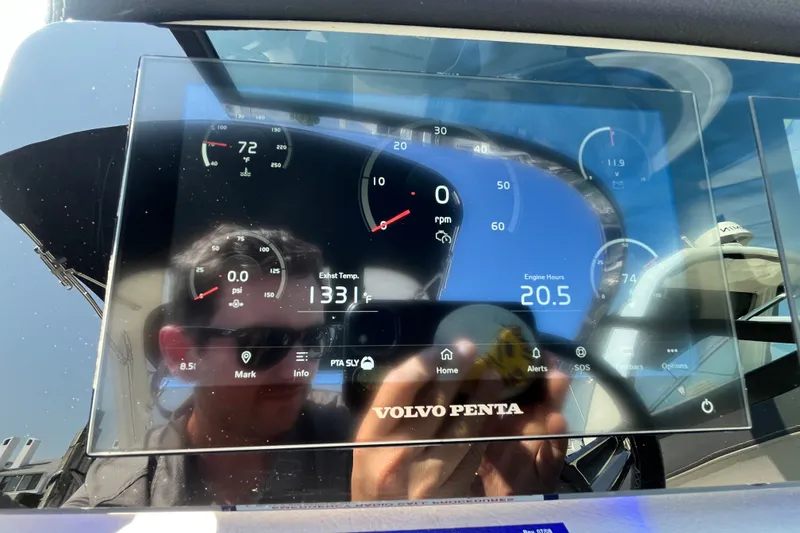 Slide: The Image of Dashboard display of a 2023 Regal LS6 boat with Volvo Penta controls. - 6