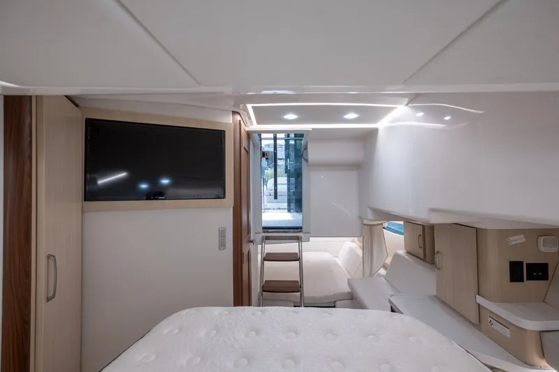 Slide: The Image of Interior of 2025 Regal 36 Grande Coupe yacht with modern amenities and sleek design. - 44