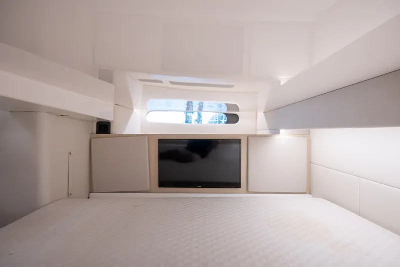 Slide: The Image of Interior cabin of 2025 Regal 36 Grande Coupe with modern design and window view. - 53