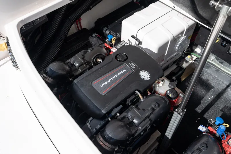 Slide: The Image of Engine compartment of 2025 Regal 36 Grande Coupe featuring Volvo Penta engine. - 58