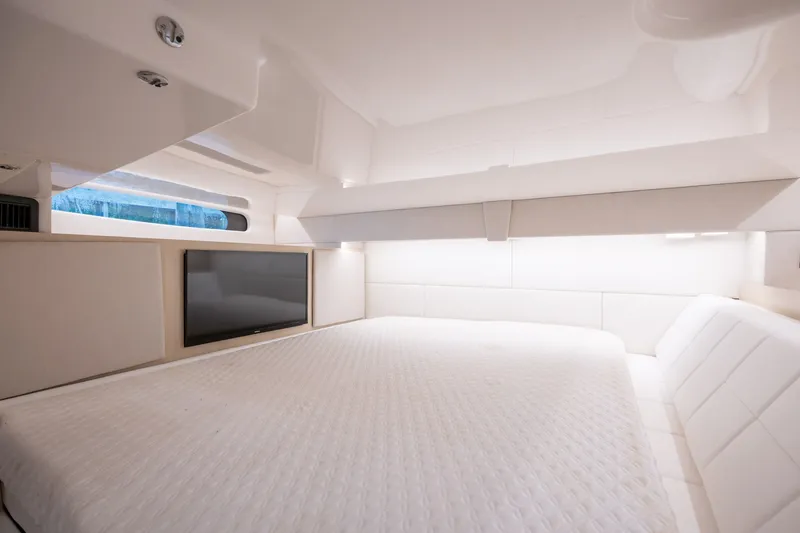 Slide: The Image of Luxurious interior cabin of 2025 Regal 36 Grande Coupe yacht with modern amenities. - 52