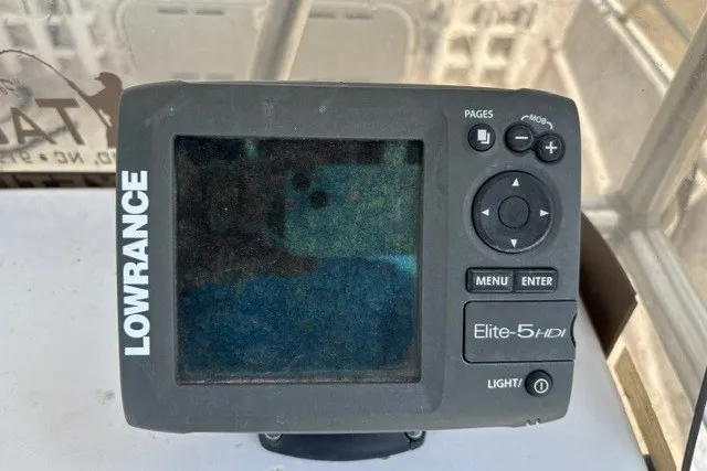 Slide: The Image of Lowrance Elite-5 HDI fishfinder on a 2001 Polar 1780 Flat boat dashboard. - 28