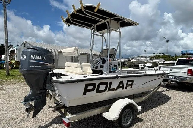 Slide: The Image of 2001 Polar 1780 Flat boat with Yamaha 115 engine on a trailer. - 8