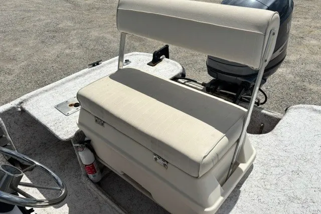 Slide: The Image of 2001 Polar 1780 Flat boat interior with cushioned seating and motor. - 22